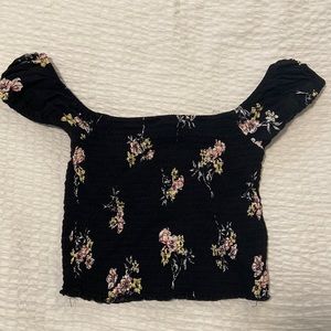 Black crop top with flowers. Off-shoulder. From Garage